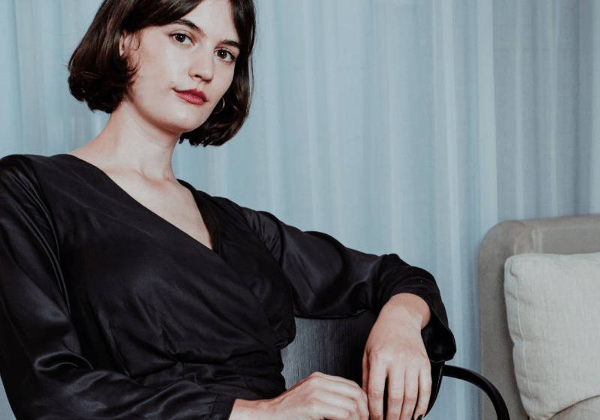 Woman wearing black bamboo silk jumpsuit