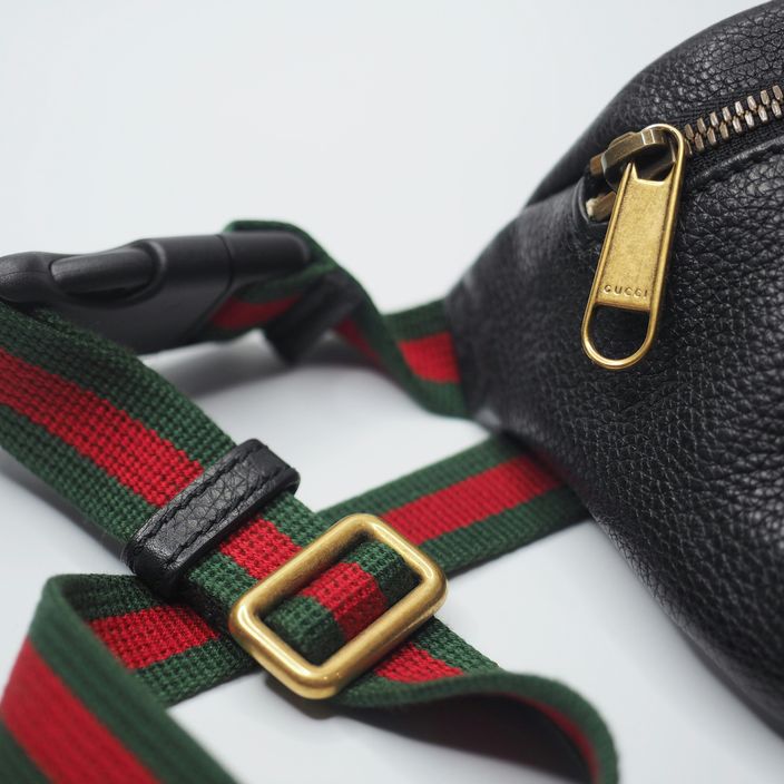 Gucci magazine on a table with accessories