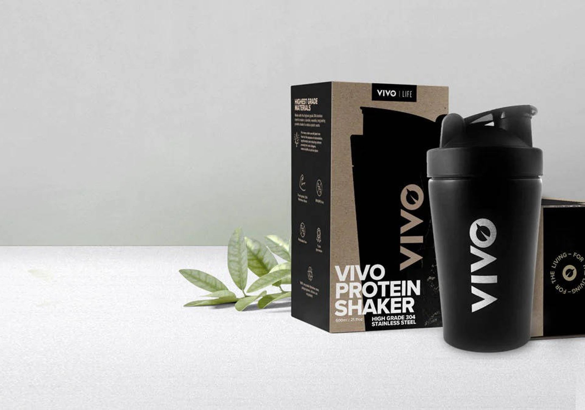 vivo life protein shaker and compostable scoop set against white backdrop
