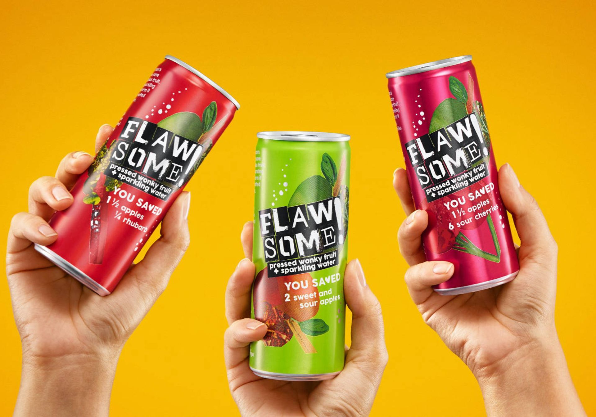 Three cans of Flawesome! juice