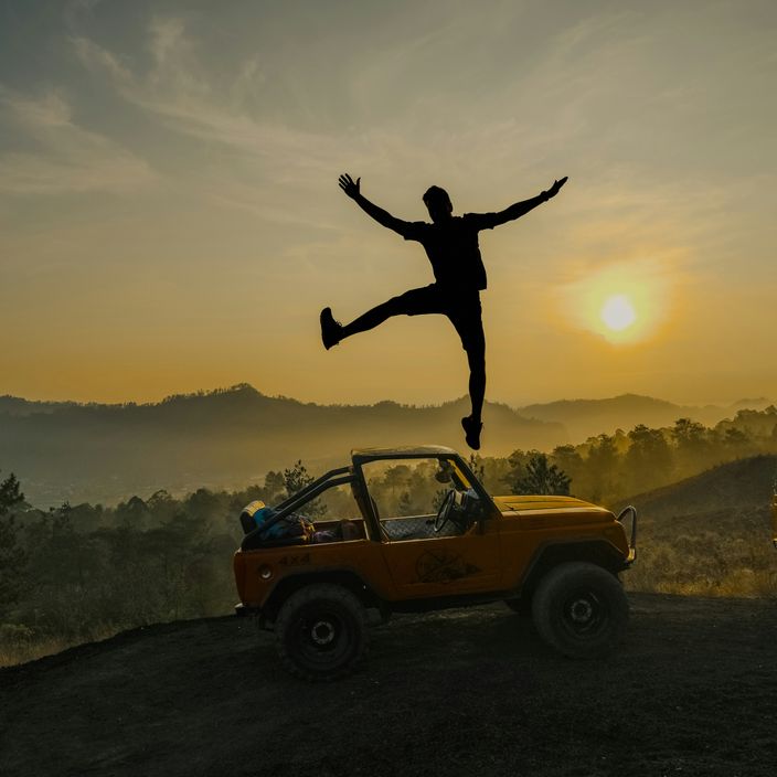 Girl sitting on jeep at mount batur tour