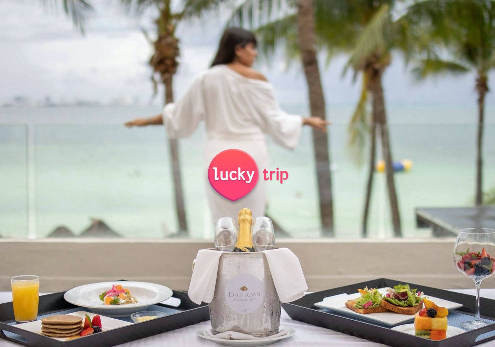 Woman at breakfast overlooking the sea
