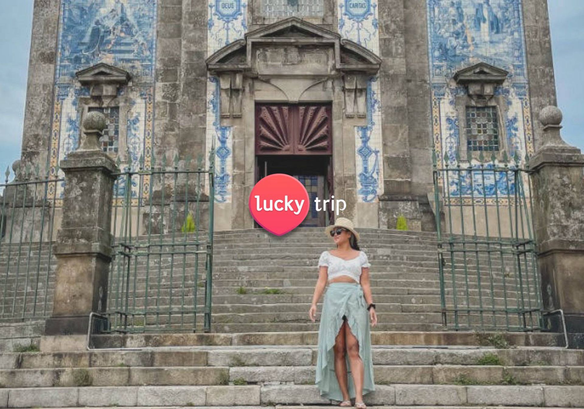 Woman on the steps of Church of Saint Ildefonso
