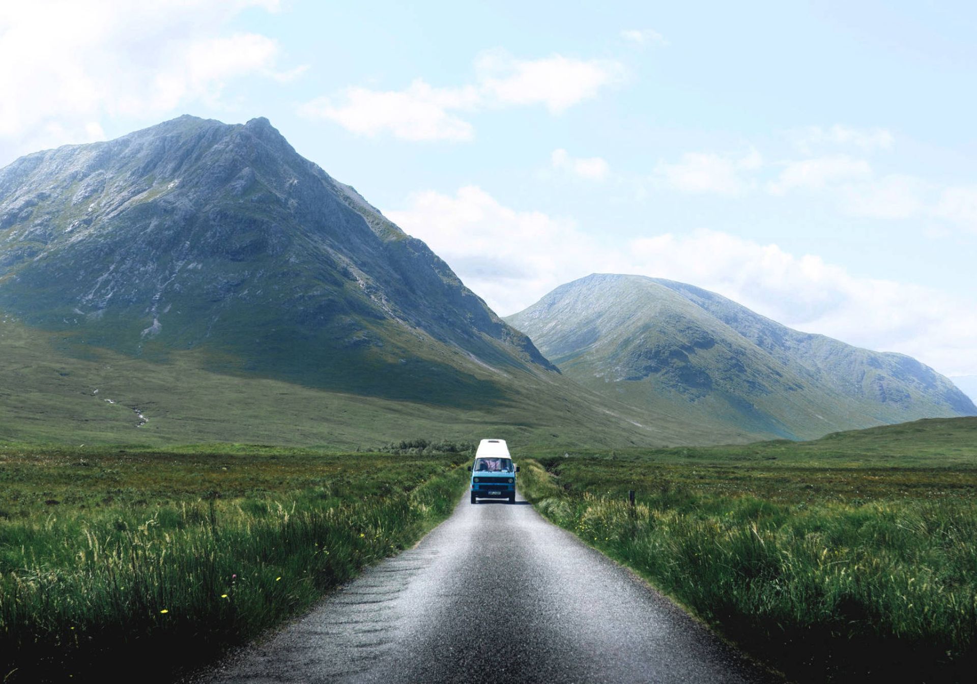 van driving through Scottish Highlands