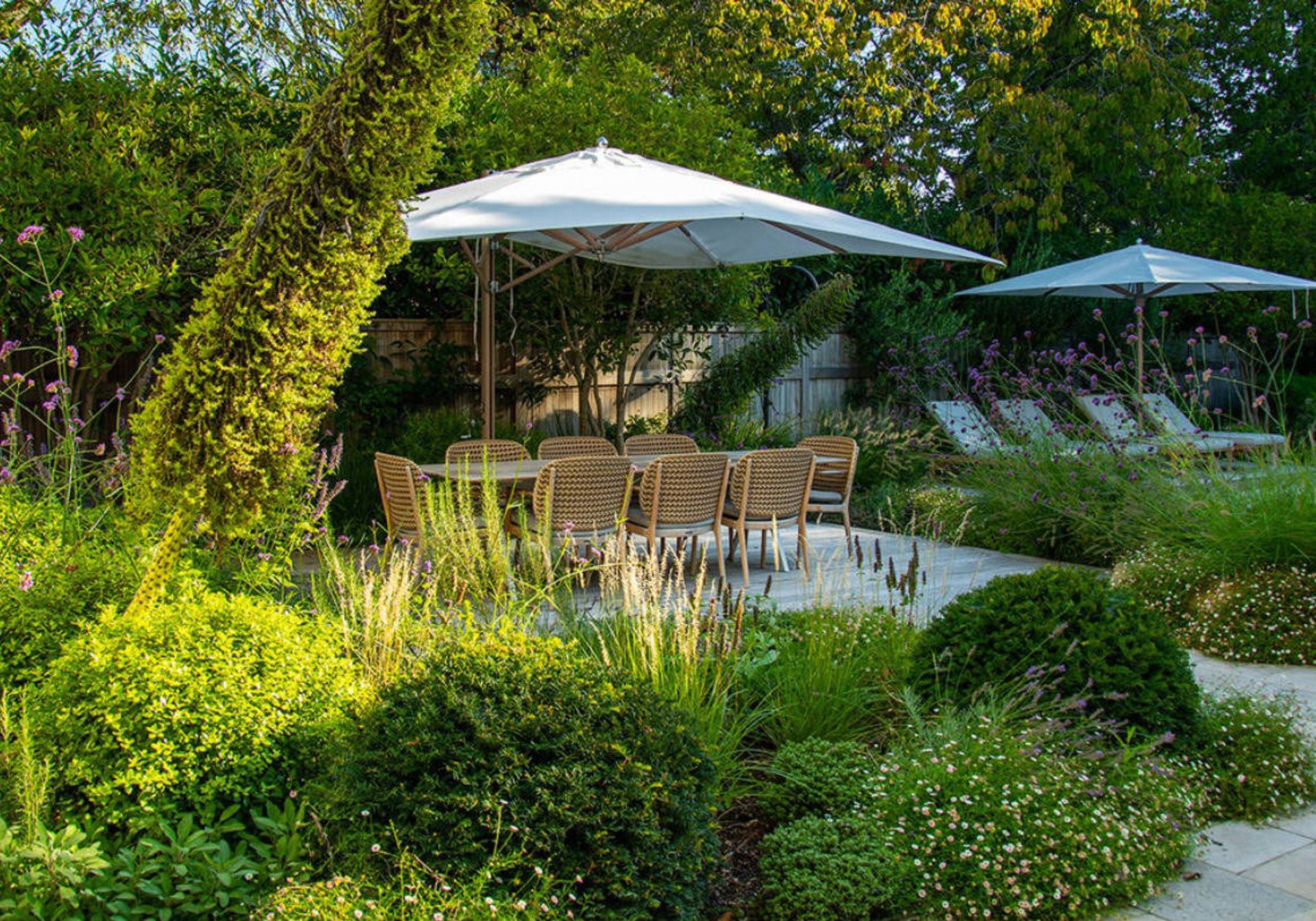 Garden table and chairs with a parasol