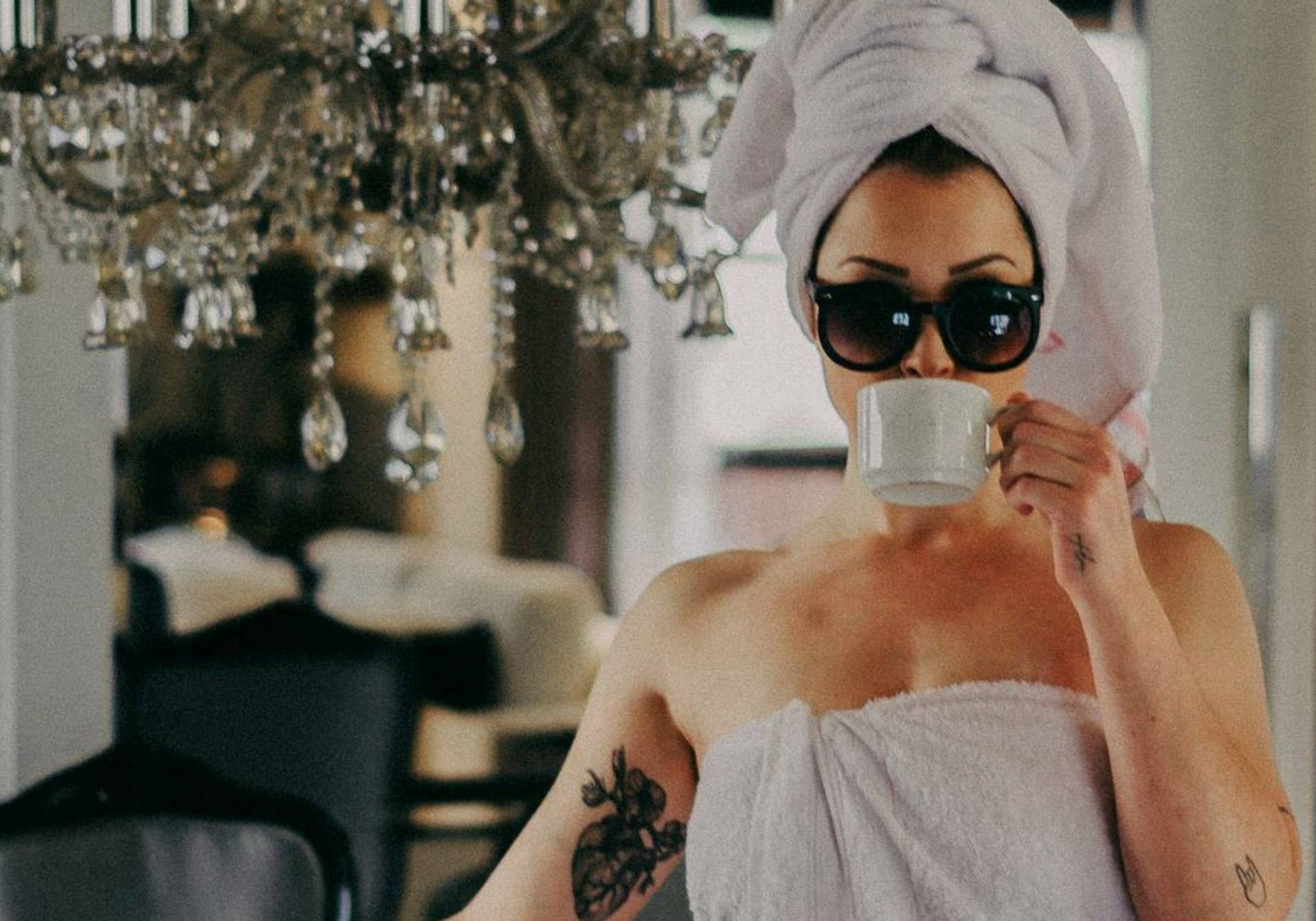 Drinking tea in a bath towel