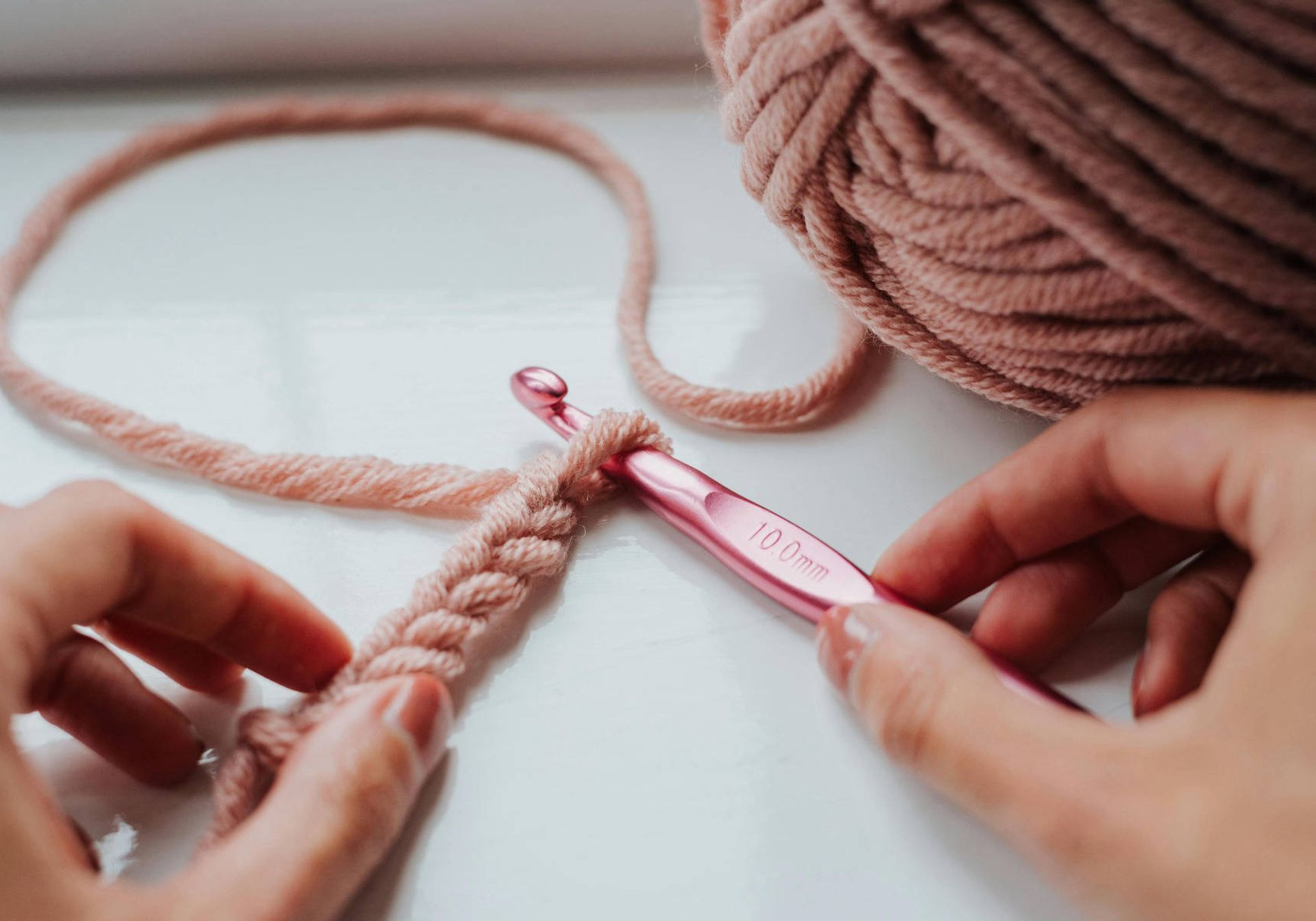 A crochet needle and some string