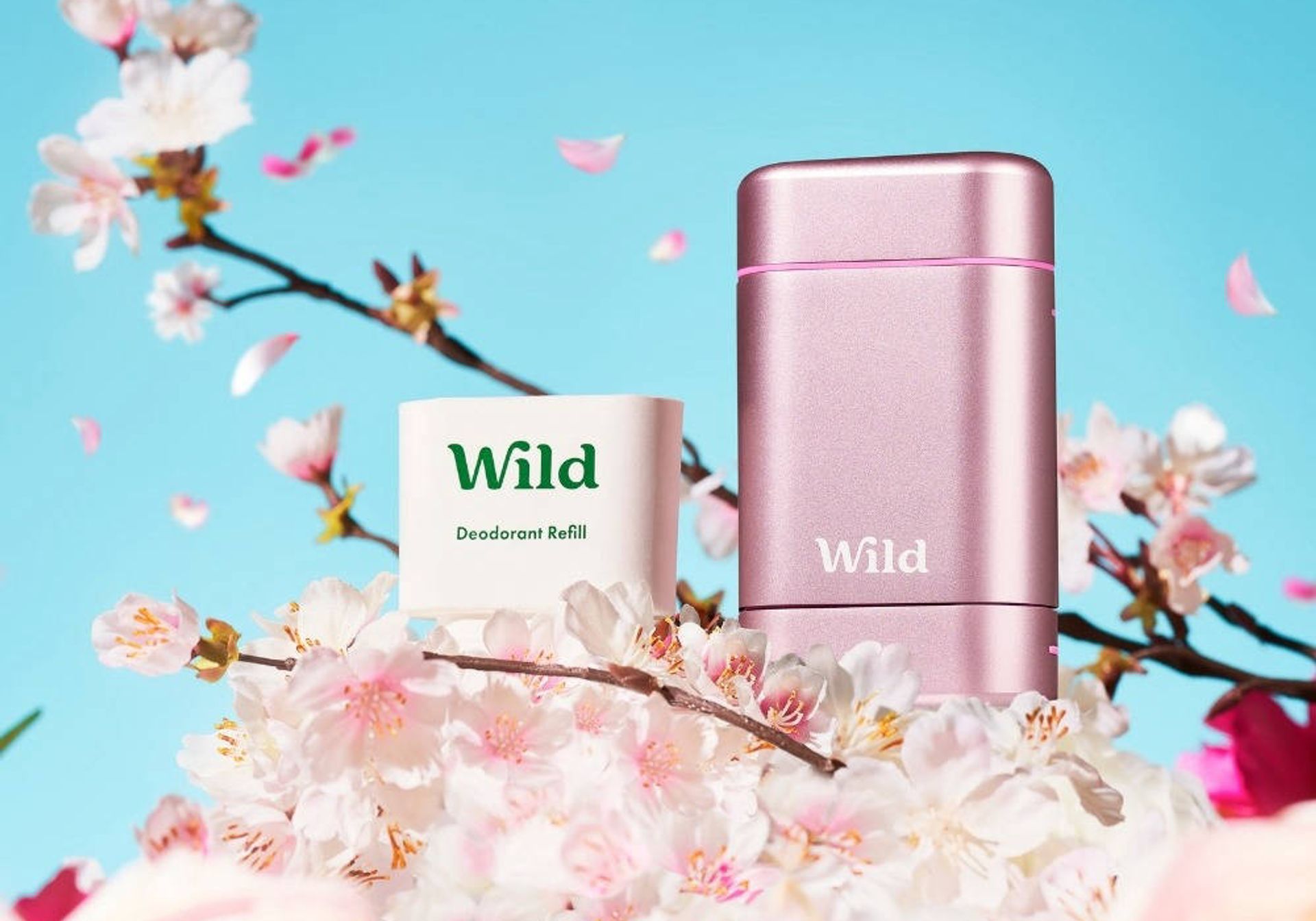 Person in bathtub with flowers and natural deodorant