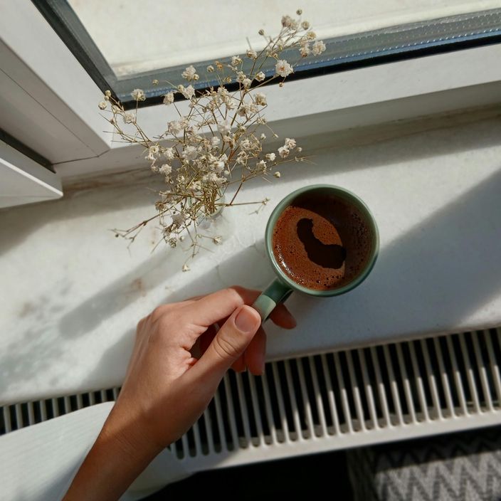 Girls Who Grind owners sat on a sofa