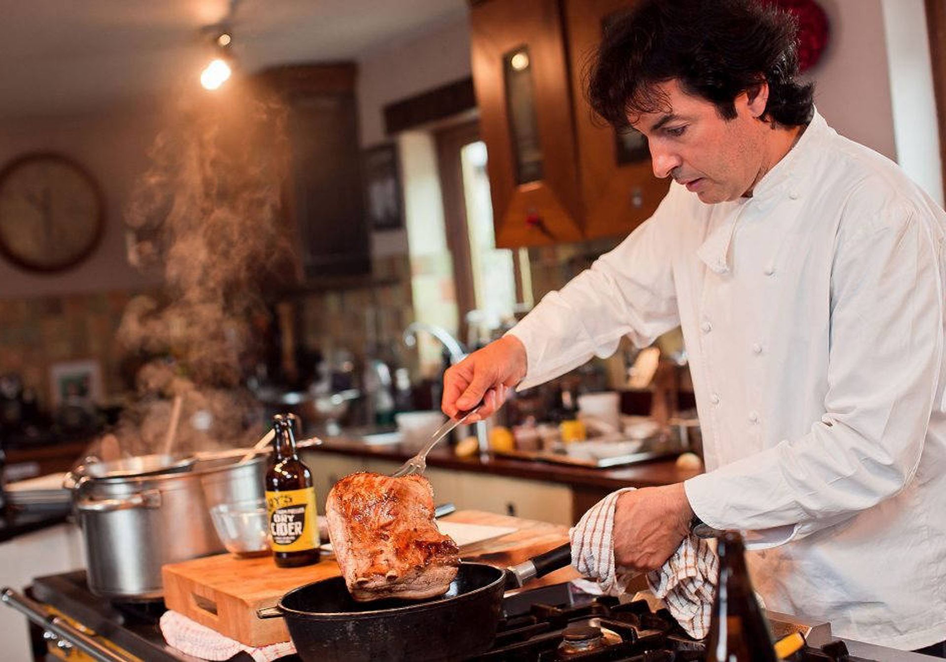 Jean-Christophe Novelli cooking in his kitchen