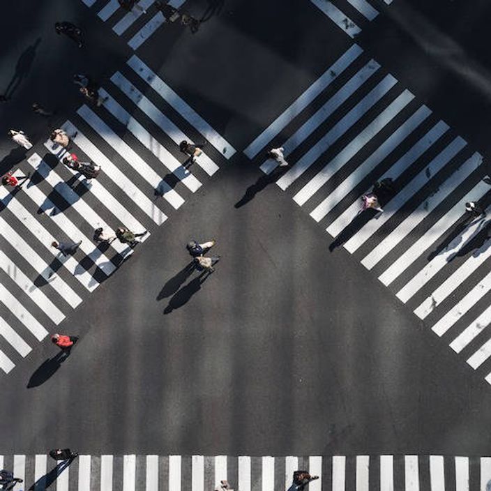 People crossing road, viewed from above