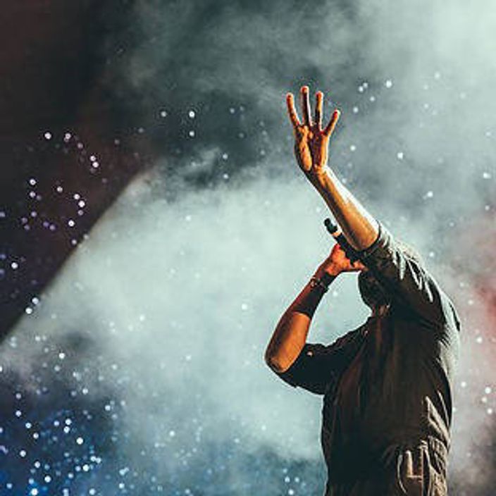Singer on stage at a concert