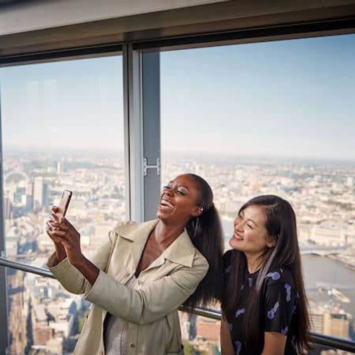 Two women taking a selfie on The Shard in London