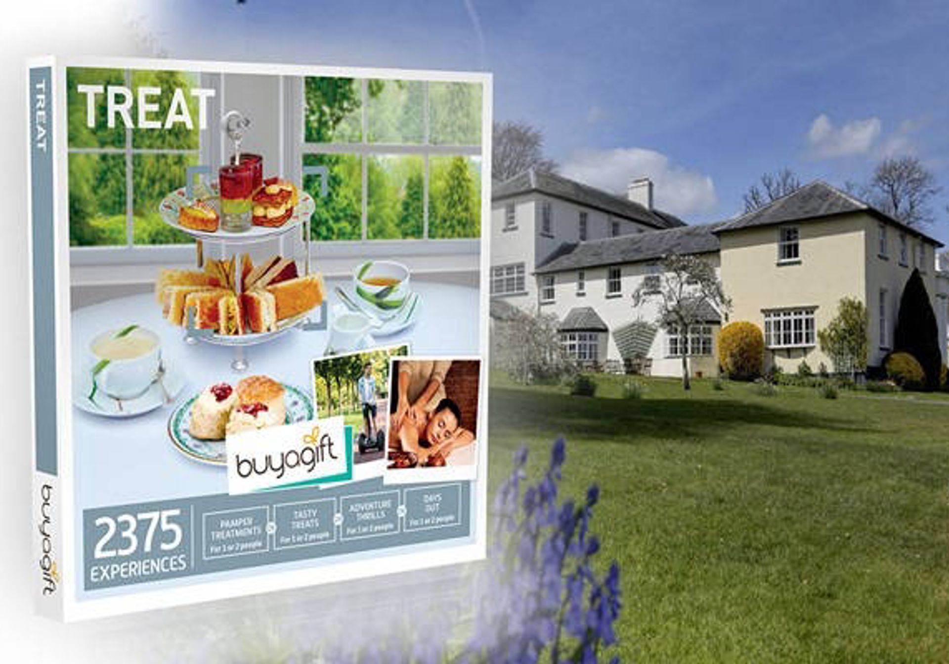 a buyagift gift box featuring a picture of afternoon tea, with a hotel on the backdrop 