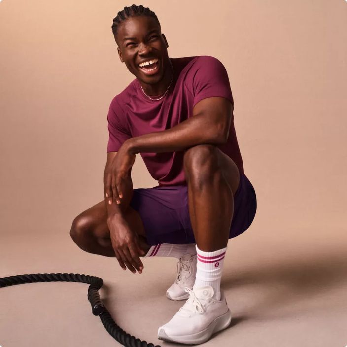 girl doing a yoga pose in lululemon clothing