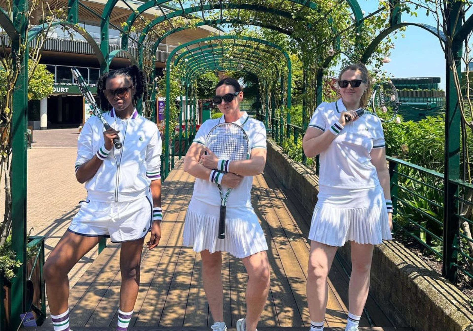 Three girls in tennis gear at Wimbledon