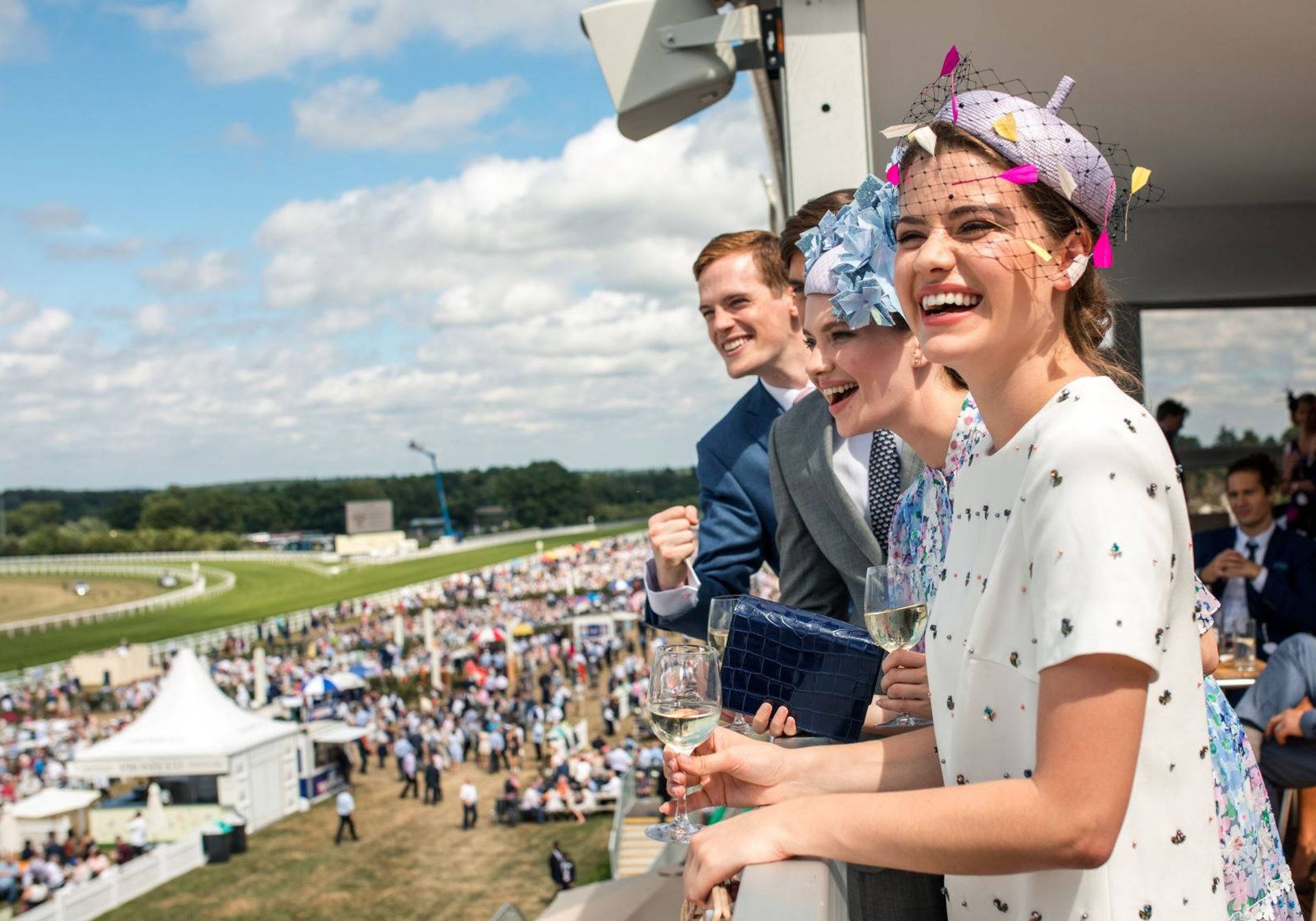 young people enjoying the horse races at royal ascot