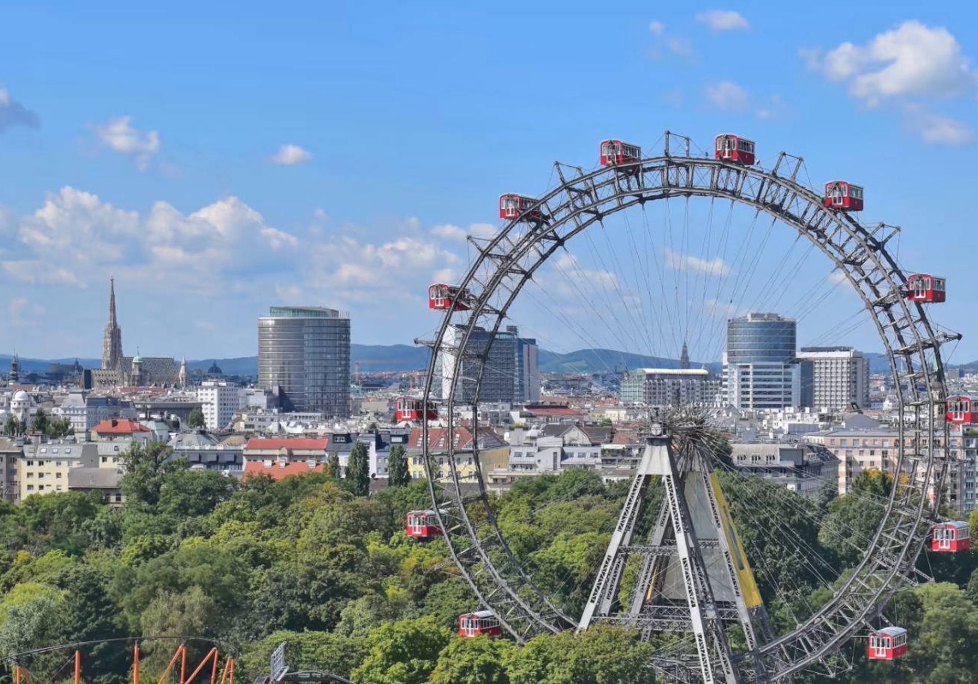 Vienna's skyline with a ferris wheel in the foreground