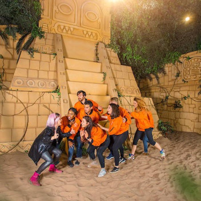 Group working together in the Crystal Maze LIVE