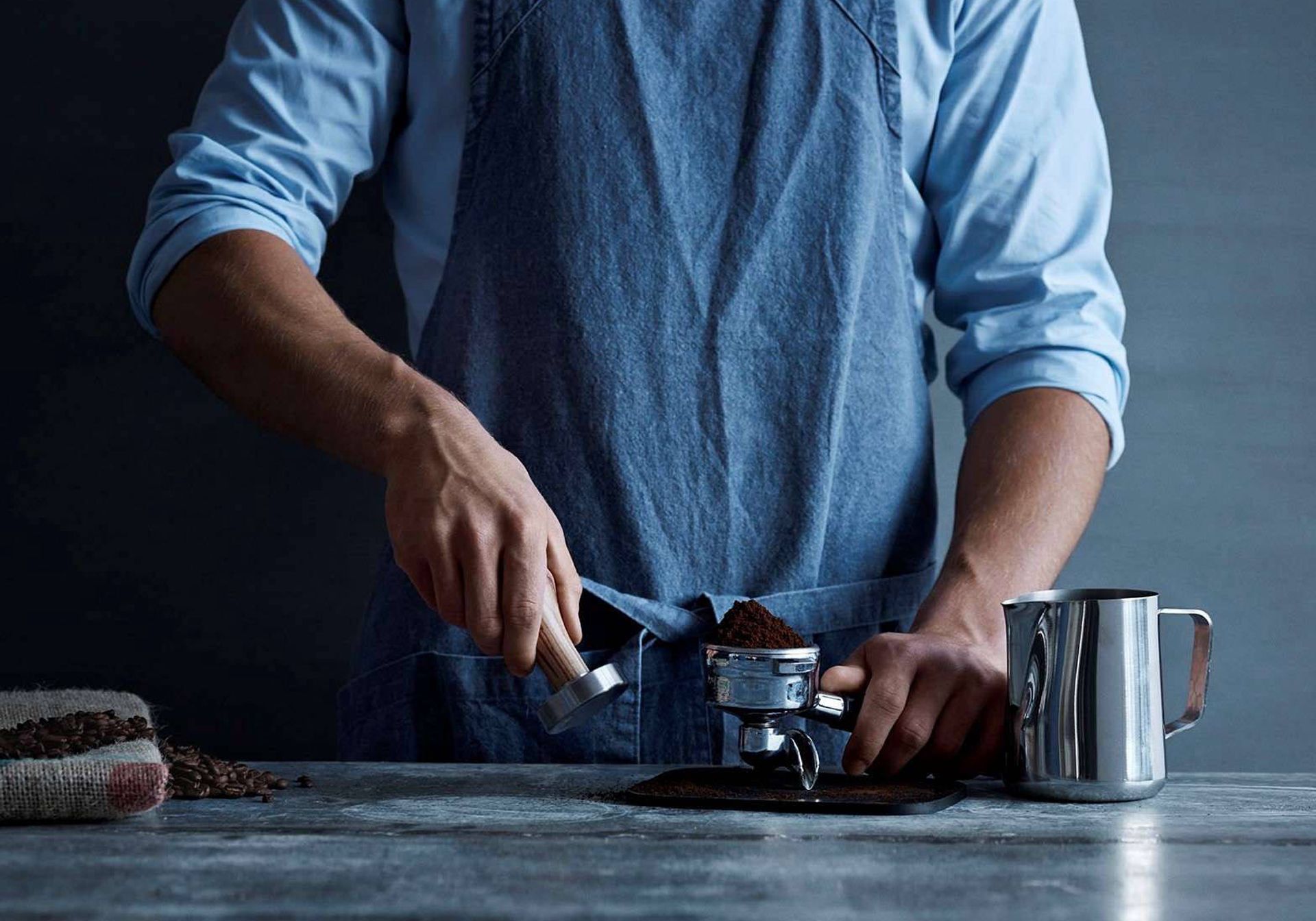 barista making coffee