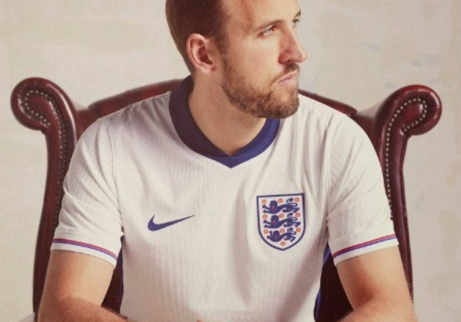 Harry Kane wearing an official England jersey