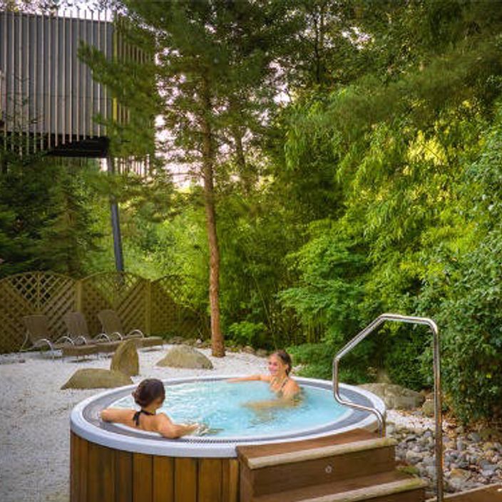 People relaxing in a jacuzzi