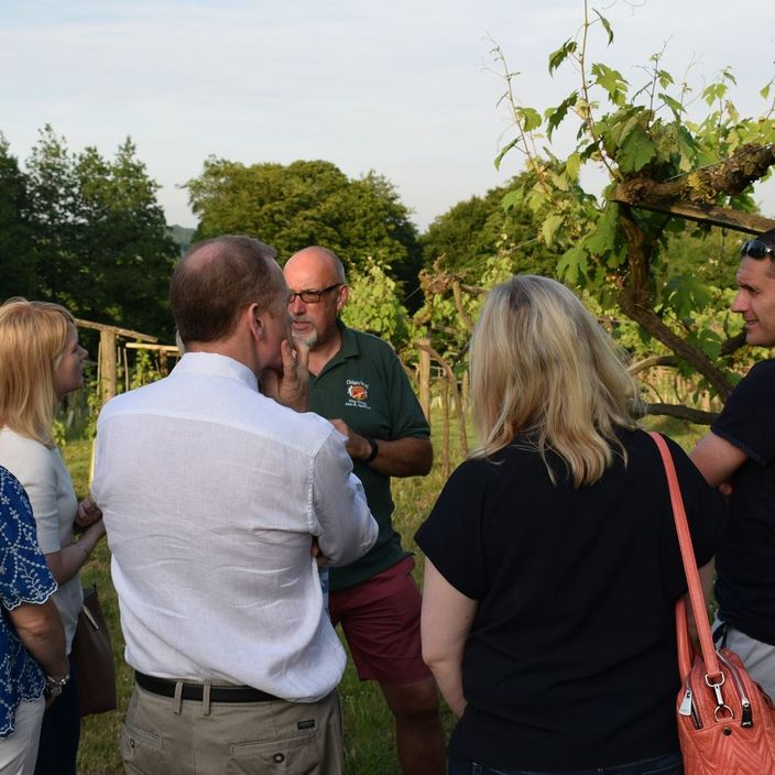 A man pouring a beer into a glass