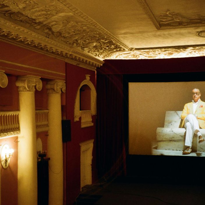 Friends laughing at the cinema