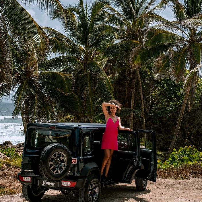 woman in suzuki jimny