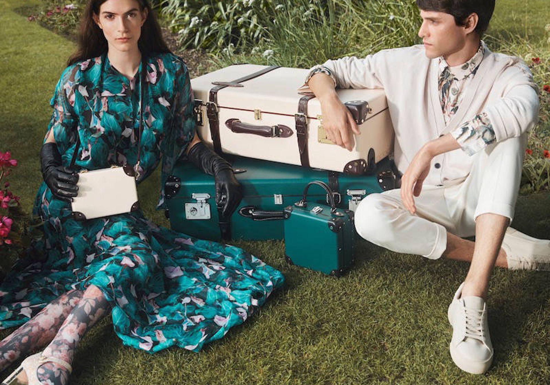 Couple with luxury brand suitcases