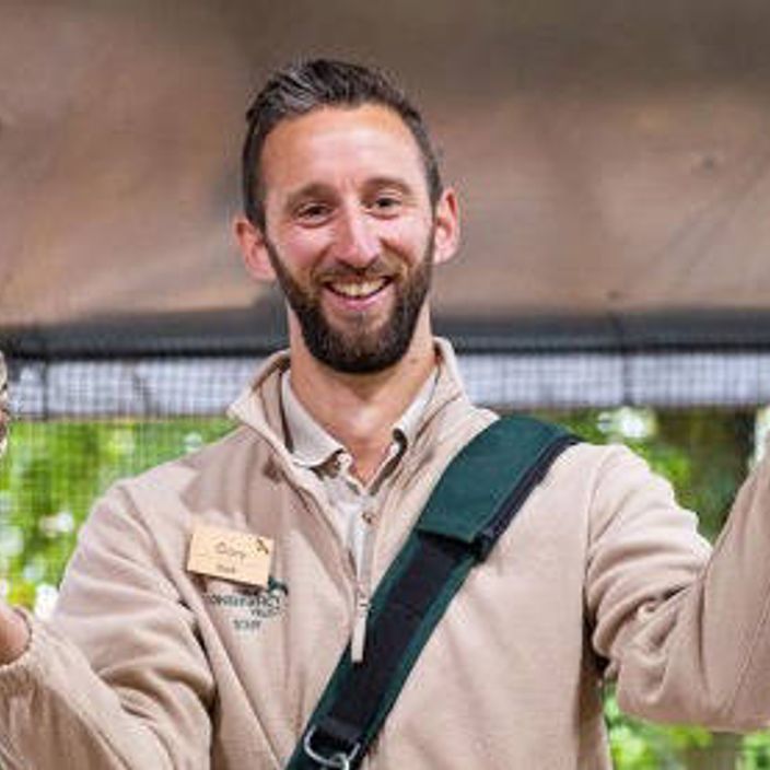 Man with owl at The Hawk Conservancy Trust