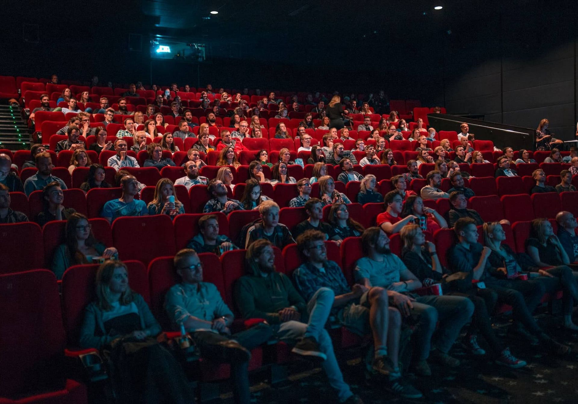 A Group of people watching a movie at the cinema