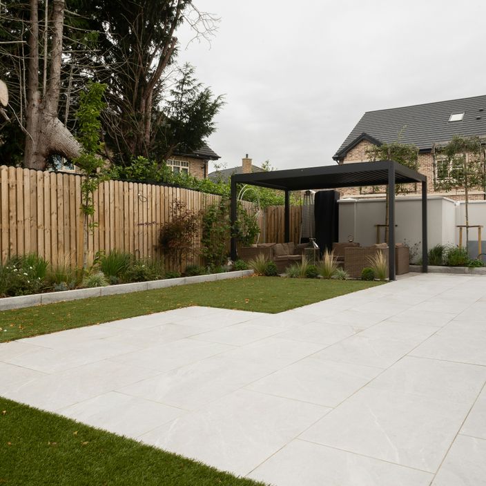 Beautiful stone decking and a landscaped garden
