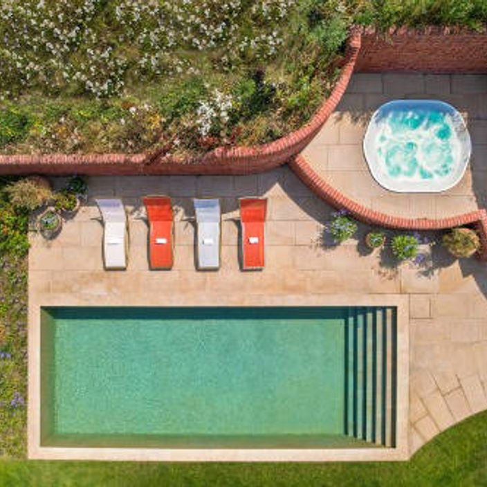 Beautiful Traditional Suffolk Farmhouse exterior top down view of pool