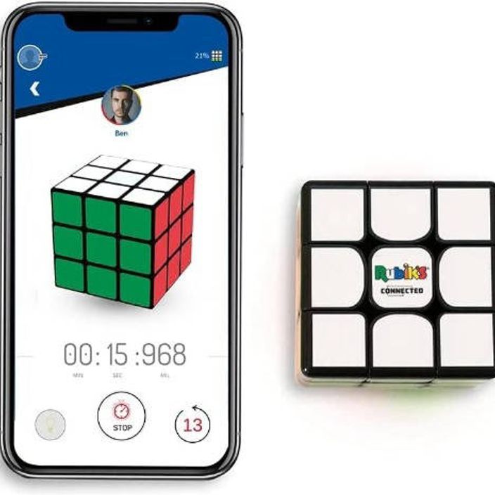 An alternate image of a Rubik's cube showing the app that comes with it on a mobile screen