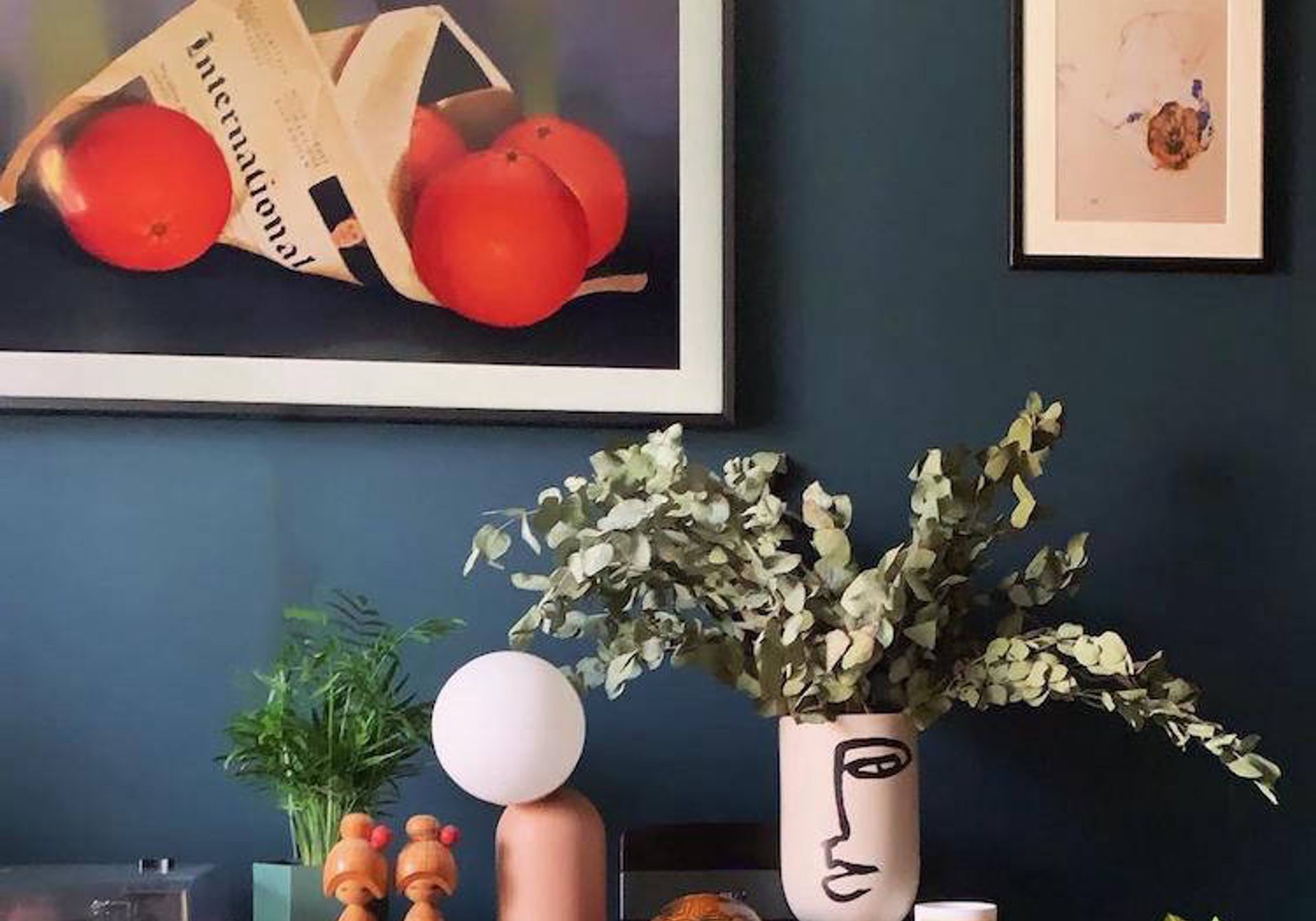 Plants and homewares on shelf