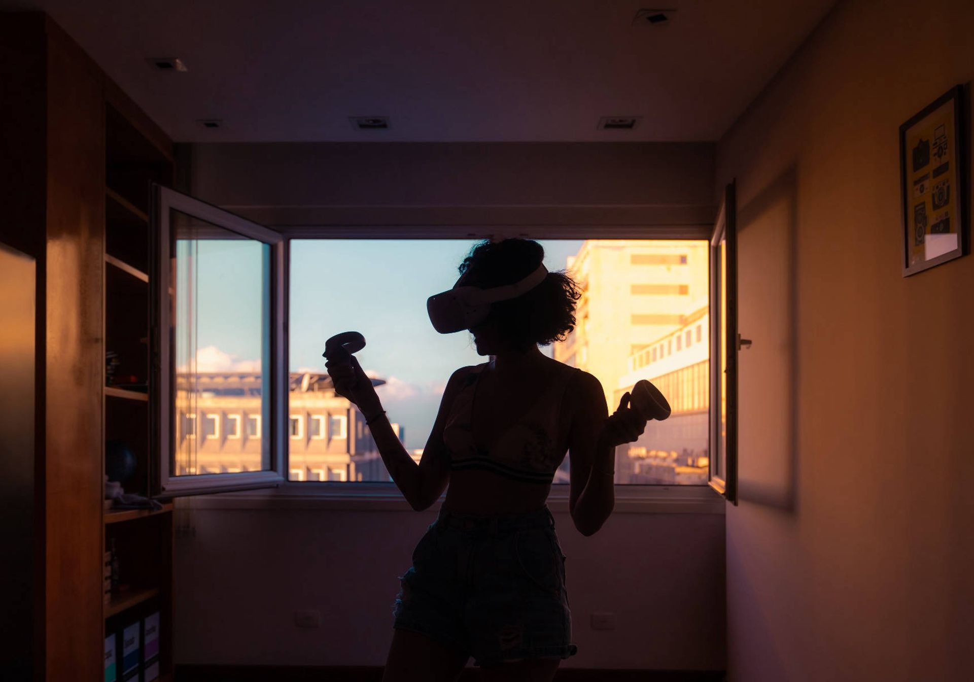 Woman playing with the Meta VR headset
