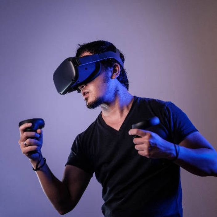 Man playing with the Meta VR headset