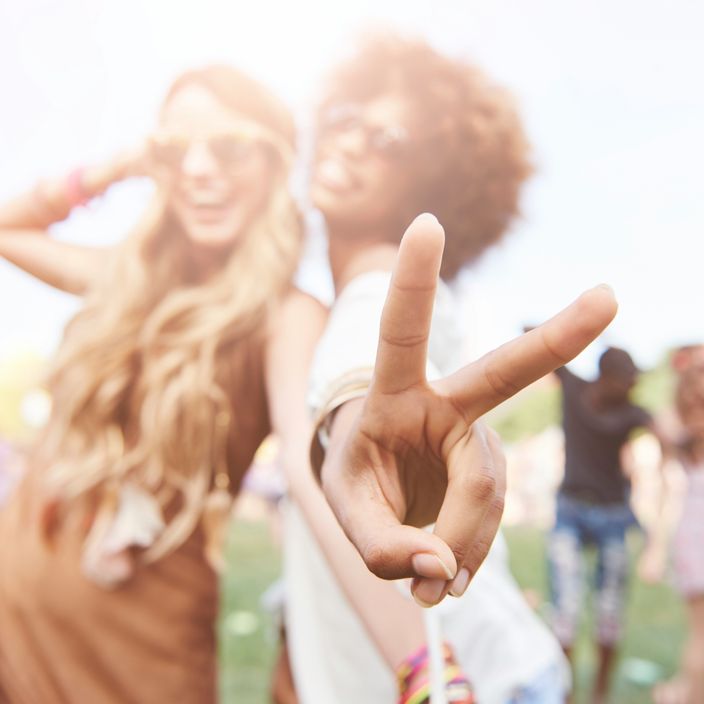 Girls posing at a festival
