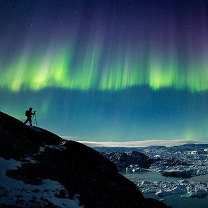 Man watching the Northern Lights