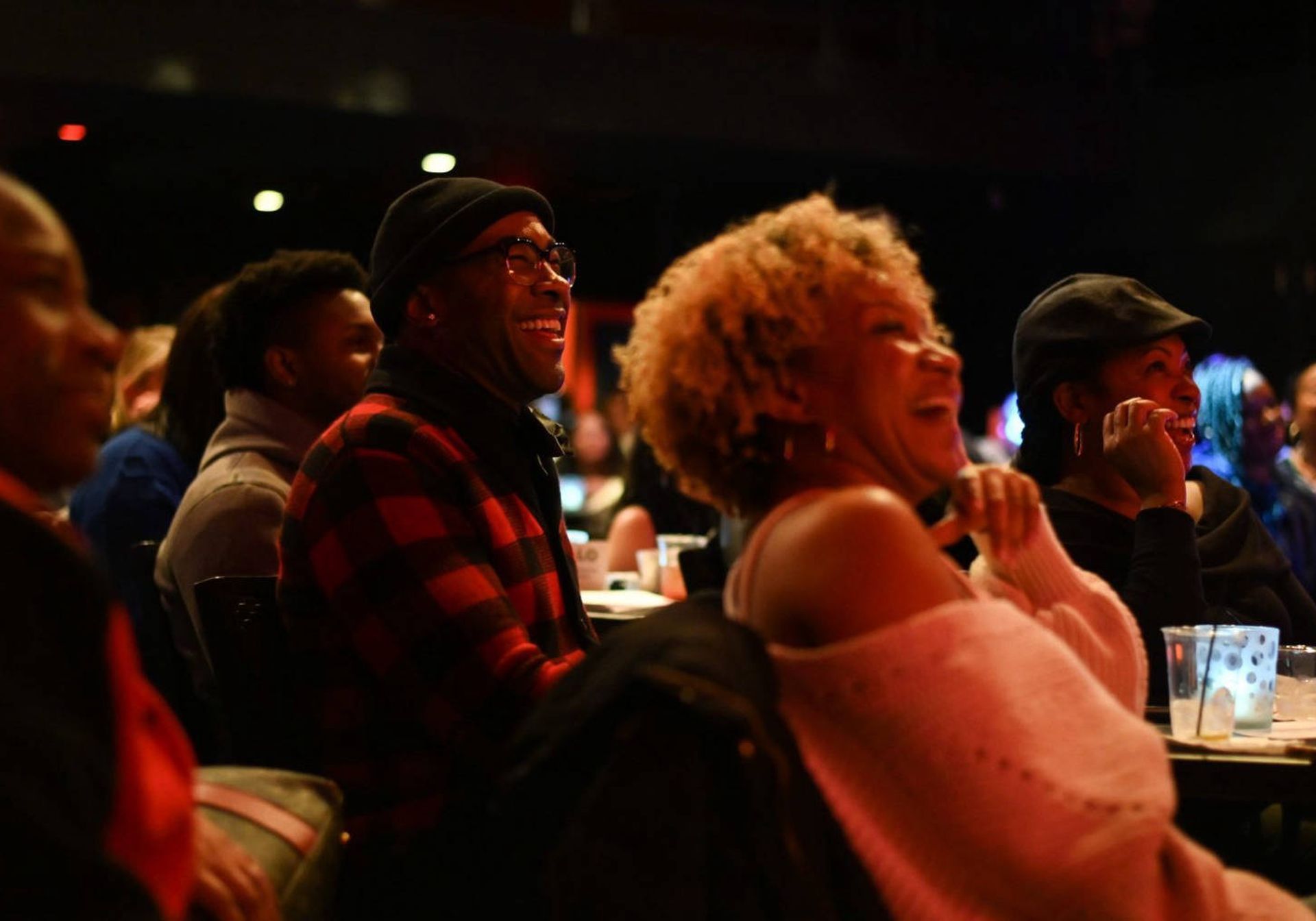 People laughing in audience