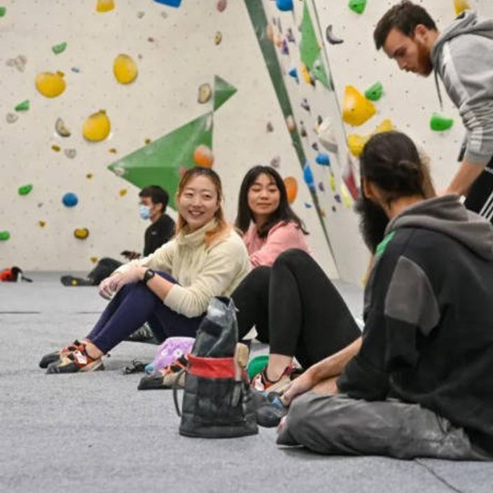 Climbers take a well earned break in a climbing centre