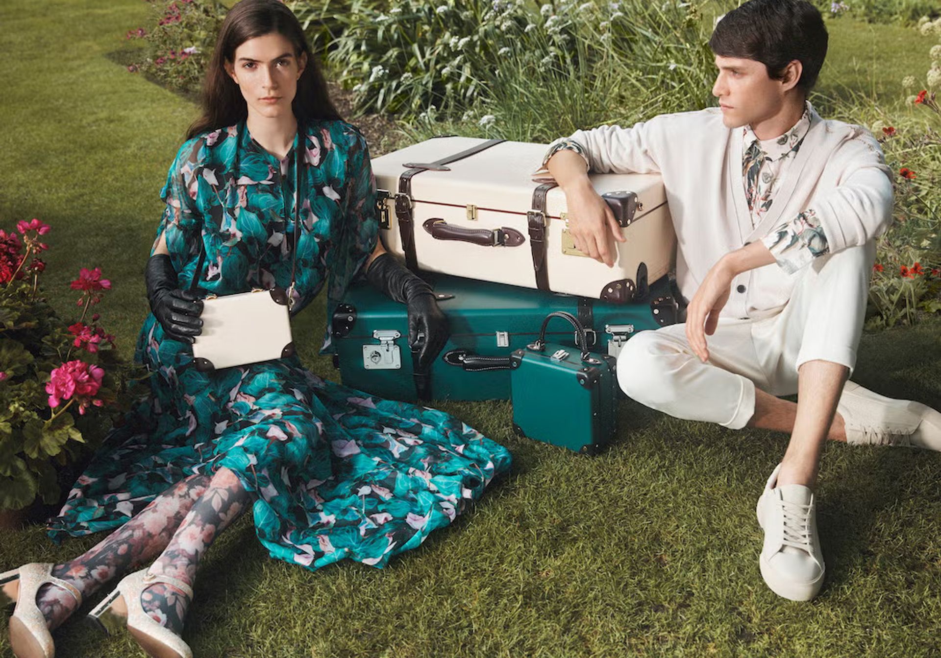 Couple with luxury brand suitcases