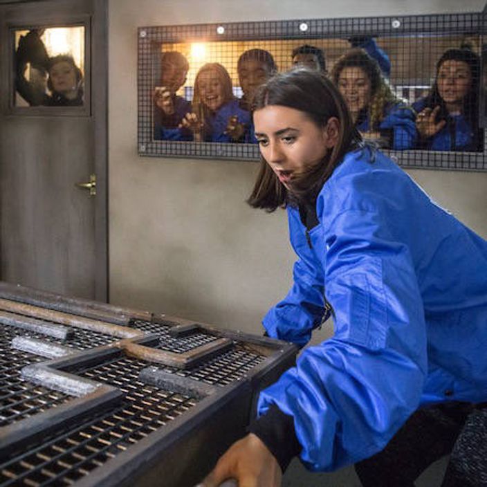 Woman in a puzzle in the Crystal Maze LIVE