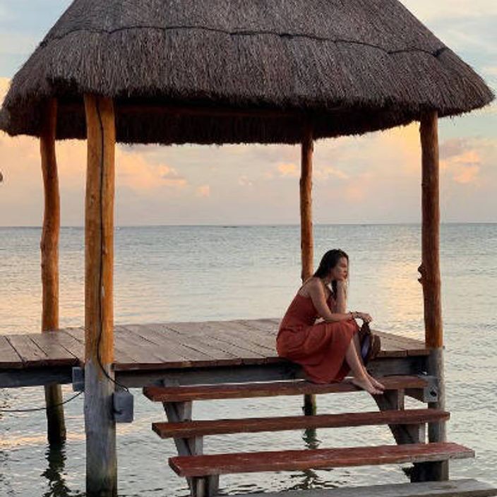 Woman on overwater deck