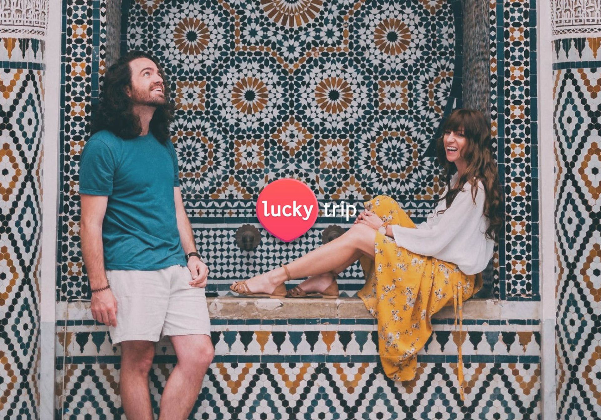 Couple sat on Moroccan tiled seat
