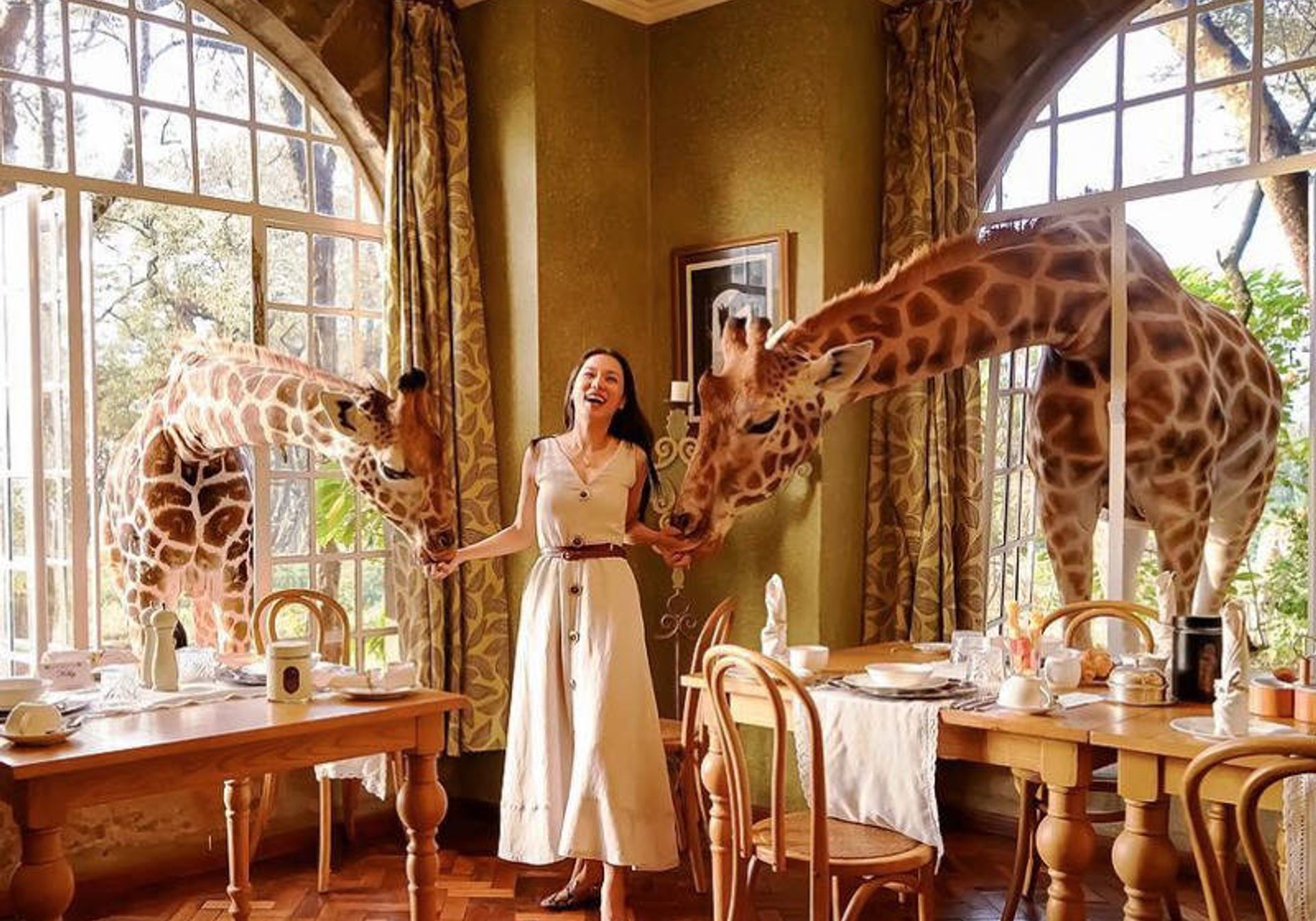 family having breakfast in giraffe manor