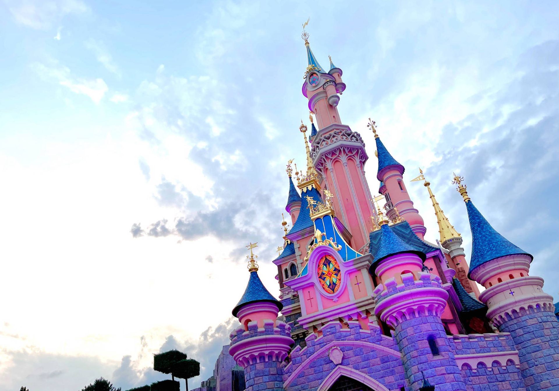 Disneyland Paris castle with sunset sky