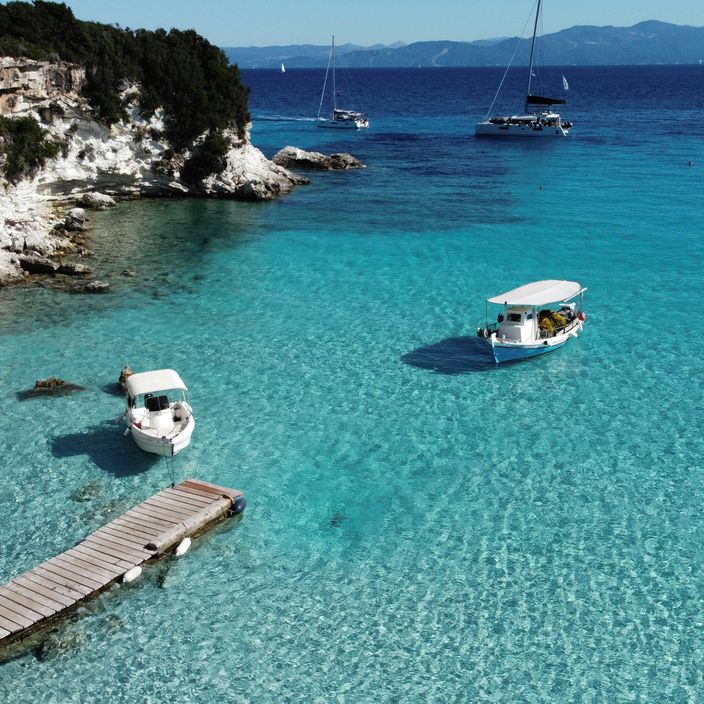Floating in crystal clear blue water