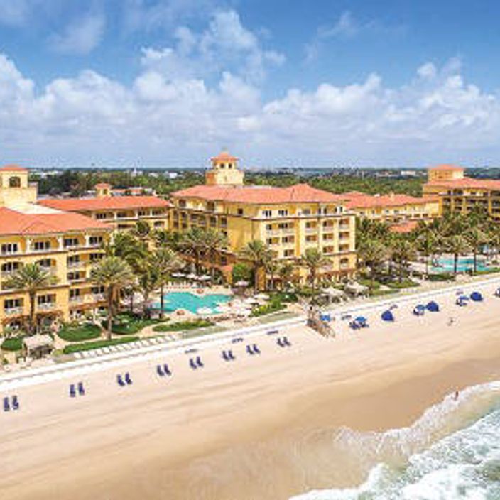View of Eau Palm Beach Resort & Spa from the beach